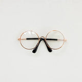 Round and heart-shaped baby glasses for newborn photography, colorful and unisex, ideal photography accessory.
