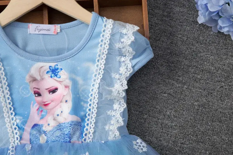 Girls summer dress with flying sleeves featuring a cartoon character, made of cotton, knee-length, casual style for ages 4-6.