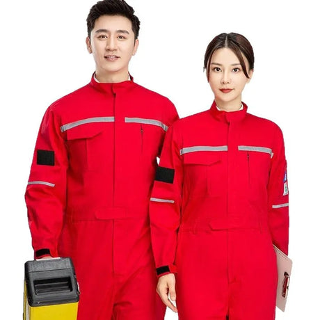 Two individuals wearing red anti-static flame-resistant welding suits with pockets, suitable for work.
