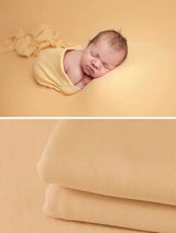 Newborn soft wrap blanket in soft beige, perfect for baby photography and cozy comfort.