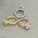 Exquisite newborn baby angel rings in gold, silver, and rose gold showcasing unique designs for infants.
