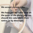 Craftsperson customizing color options for a wedding dress, demonstrating personalized tailoring services.