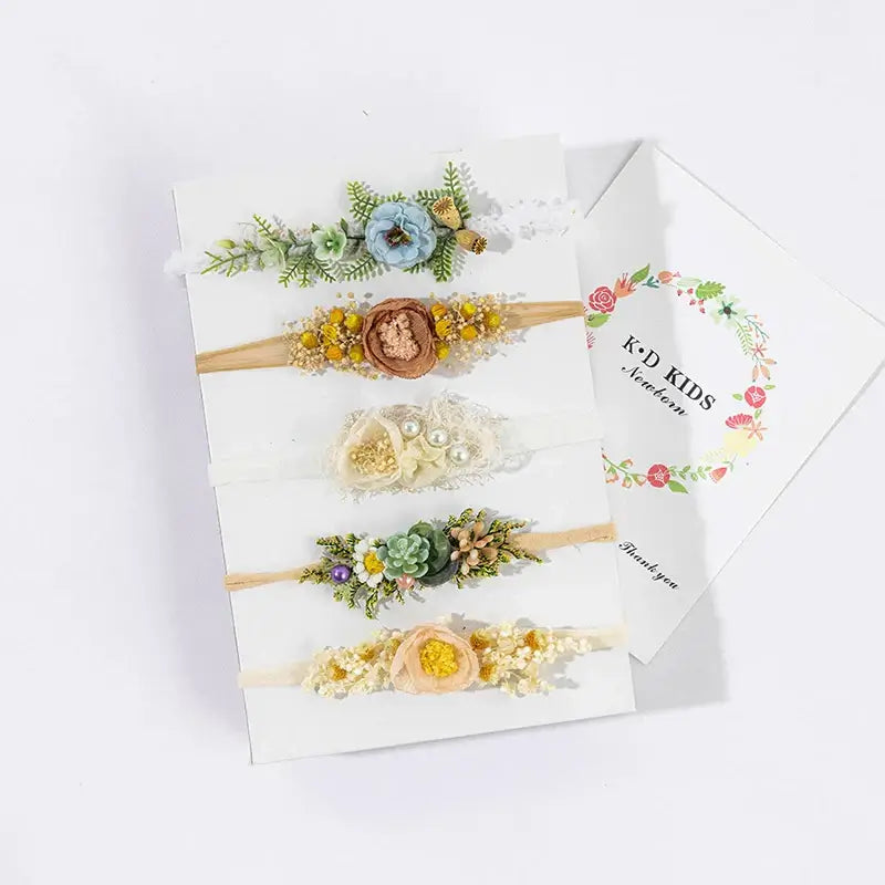 Set of adjustable faux flower headbands for newborn photography, perfect for girls aged 0-6 months.