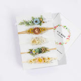 Set of adjustable faux flower headbands for newborn photography, perfect for girls aged 0-6 months.