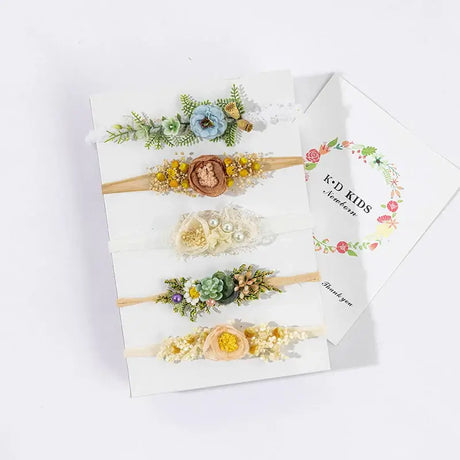 Set of adjustable faux flower headbands for newborn photography, perfect for girls aged 0-6 months.