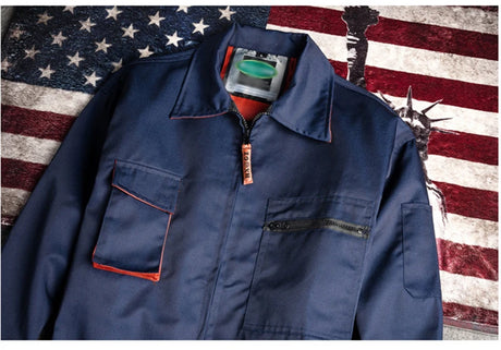 Navy mechanic welding coveralls featuring zippered pockets on an American flag background.