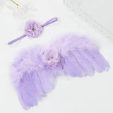 Cute newborn angel feather wings with purple accents and matching flower headband, ideal for baby photography.