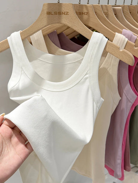 RibFlex™ Basic O-Neck Tank in white, showcasing summer comfort and high elasticity, hung on display.