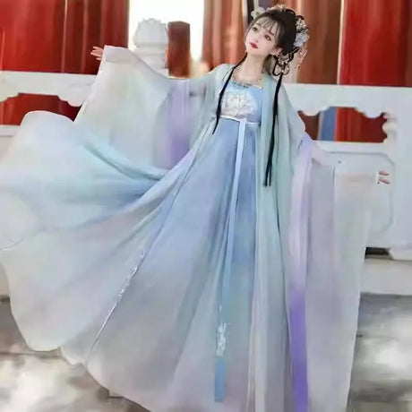 Hanfu traditional dress in soft pastel colors, featuring flowing sleeves and elegant design, perfect for parties and special occasions.