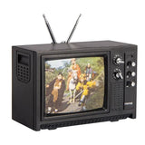 Miniature vintage television set with antenna displaying a scene of people in traditional clothing.