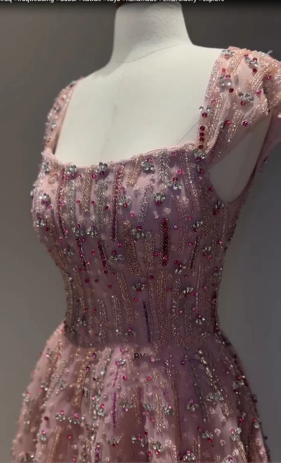 Glitter crystal mermaid wedding gown with beading and sequins, floor-length design, featured in pink.