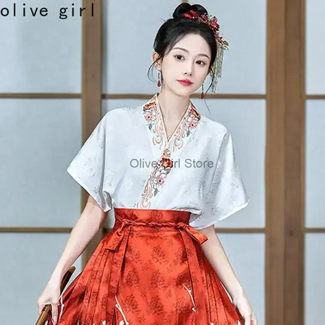 Traditional Hanfu oversized embroidered blouse for women, featuring elegant design and delicate embroidery by Olive Girl.
