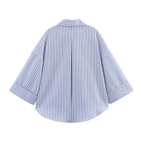 WideLine™ oversized striped shirt with loose fit, back view showing turn-down collar and wide sleeves.