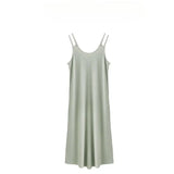 Sleeveless strap maternity dress in light green, casual summer style, perfect for outdoor wear.