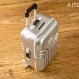 BABI Boy Clothes Creative Mini Suitcase for babies, silver design with wheels, perfect for ages 0-12 months.