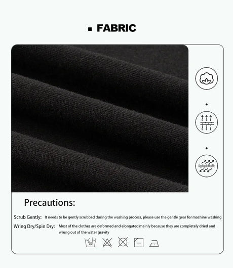 Close-up of fabric care instructions for a black garment, detailing washing and drying precautions.