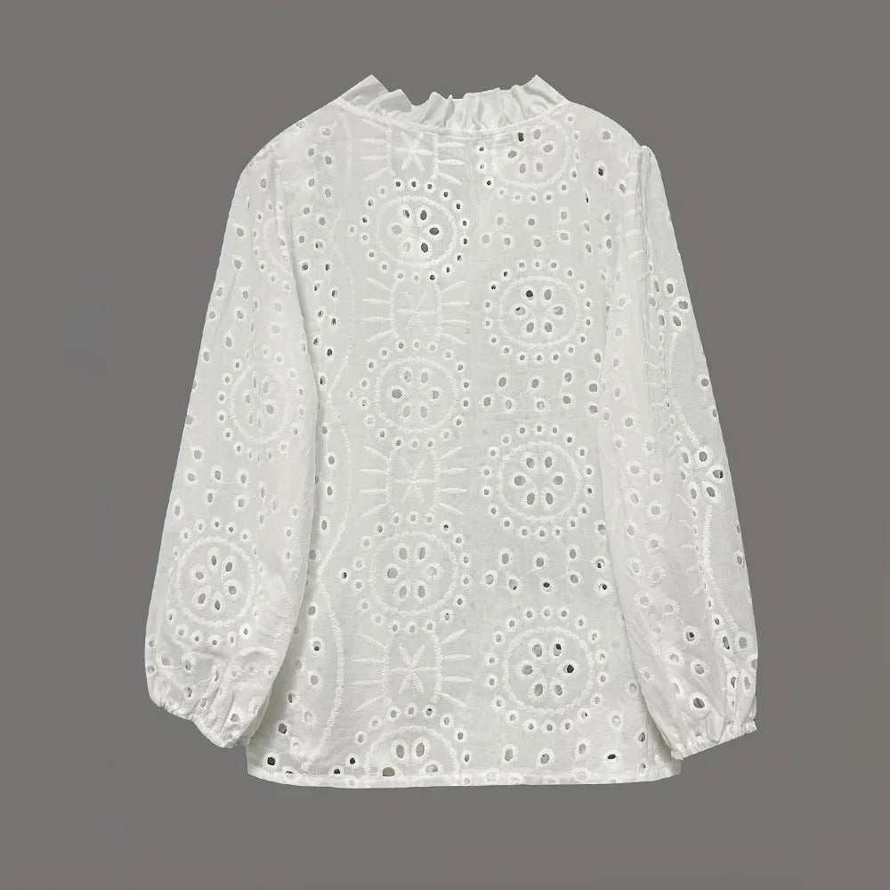 Back view of LaceWhisper™ hollow out white lace shirt with long sleeves, featuring intricate lace patterns.