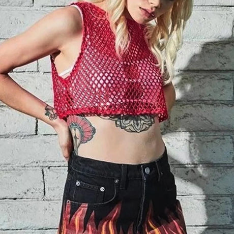 Model wearing MeshGlow™ hollow-out summer crop top in red fishnet, showcasing a casual and breathable summer style.