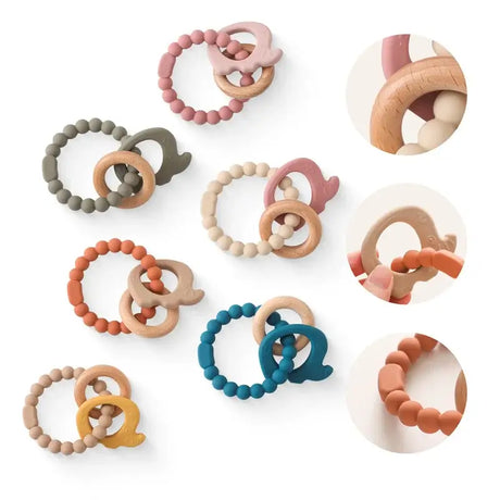 Colorful silicone baby teether rings in various shapes and colors, perfect for relieving teething pain for infants.