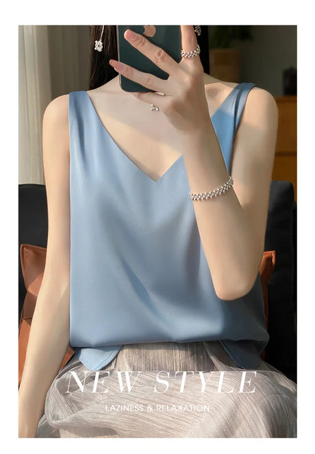 Elegant blue satin camisole with V-neck, perfect for casual or office wear.