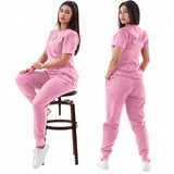 Women in pink breathable medical scrub sets, showcasing elastic short sleeve workwear from the front and back.