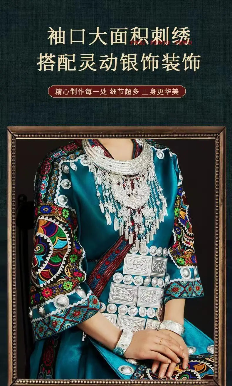 Miao embroidery suit featuring intricate designs and silver jewelry, perfect for festival celebrations and cultural events.