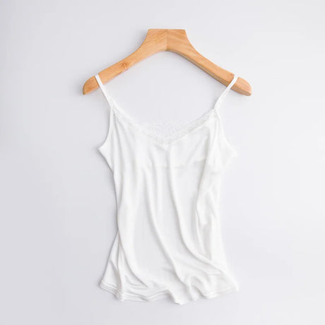 LuxeLace™ silk camisole tank top in white, sleeveless with delicate lace detail, hanging on a wooden hanger.