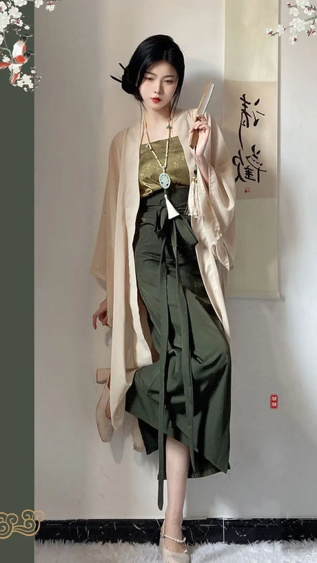 Elegant woman wearing a three-piece Princess Song Dynasty Hanfu robe with a stylish kimono and accessories.