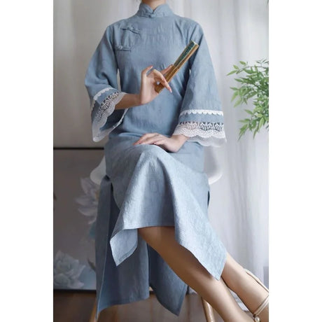 Cotton jacquard cheongsam dress in light blue, featuring lace sleeves and elegant fit.