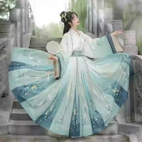 Elegant woman in a Hanfu traditional dress, showcasing intricate designs, perfect for parties and cultural events.