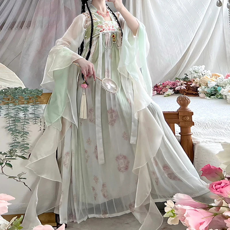 Vintage Chinese style Hanfu dress for women, featuring delicate floral patterns and flowing sleeves, made from lightweight polyester.