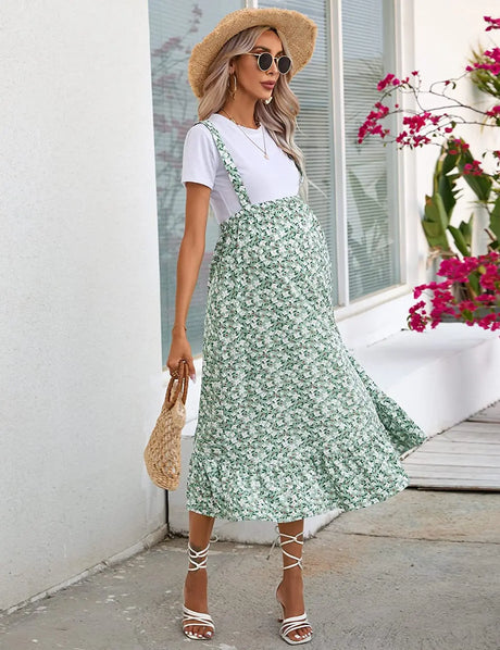 Comfortable maternity summer dress featuring a floral pattern, designed for casual wear with a fresh, sweet style.