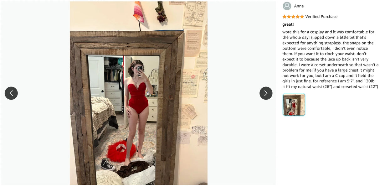 Woman in a red strapless bodysuit posing in front of a mirror, showcasing a comfortable and stylish nightwear look.