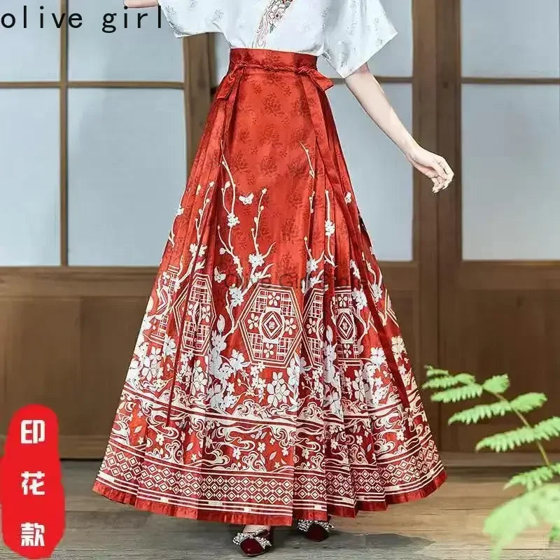 Traditional Hanfu oversized embroidered blouse by Olive Girl, featuring vibrant red fabric and intricate floral designs.