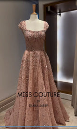Elegant pink evening gown by Miss Couture, embellished with sequins and beads, showcasing a classic square neckline.