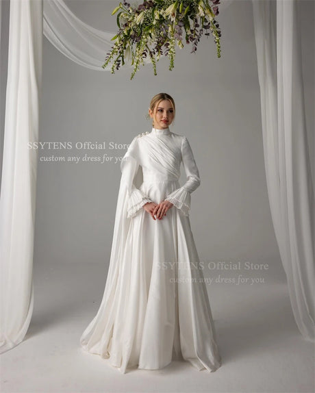 Elegant Muslim satin wedding dress featuring pearls, high neck, and long sleeves, perfect for any age.