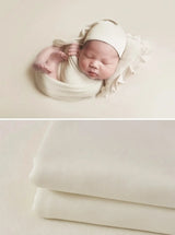 Newborn Soft Wrap Blanket in soft cream color, ideal for baby photography and comfortable for infants.