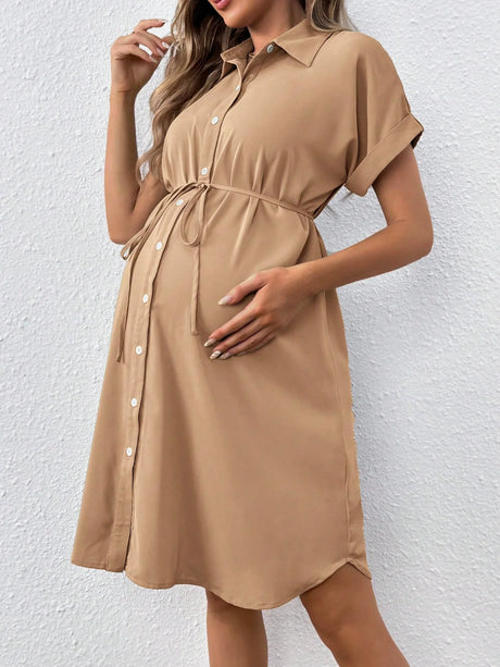 Casual summer maternity dress in solid brown with button-down design and gathered waist, ideal for expecting mothers.