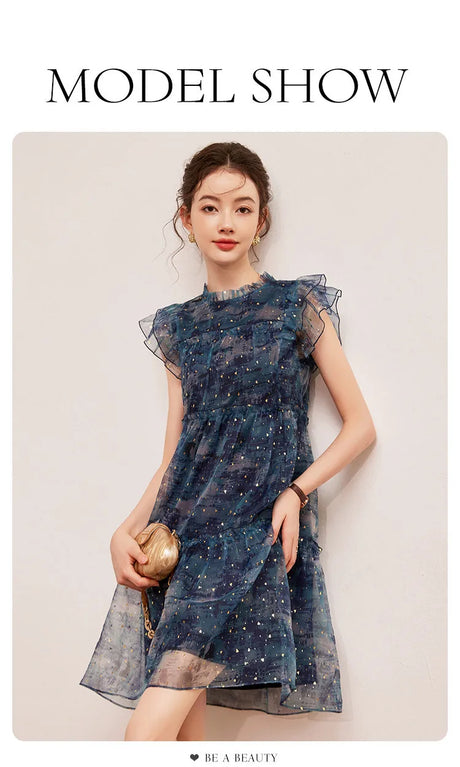Model showcasing LOUIS YAO Sparkling Dress with flounced edge and patchwork design, perfect for summer.