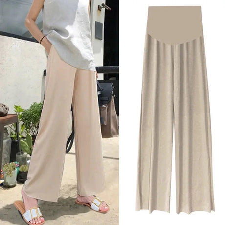 Breathable wide-leg maternity pants in natural color, ideal for summer with adjustable waist, designed for comfort.