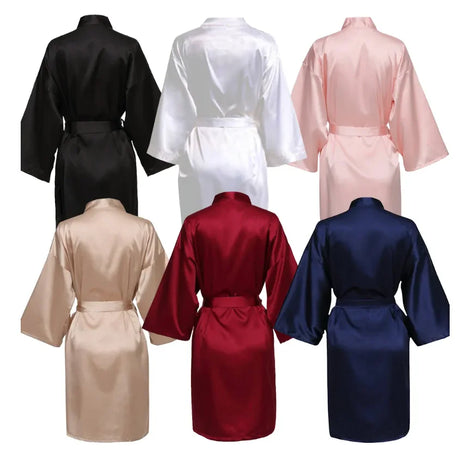 Collection of satin robes in various colors including black, white, pink, and red displayed from the back.