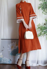Cotton jacquard cheongsam dress in orange, featuring lace details and elegant sleeves, perfect for boys.