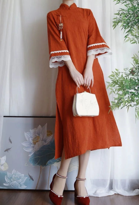 Cotton jacquard cheongsam dress in orange, featuring lace details and elegant sleeves, perfect for boys.