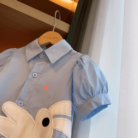 Light blue summer dress for girls with cartoon design, knee-length, and turn-down collar, perfect for ages 4-6.