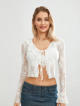 Model showcasing TieGlam™ sheer lace crop cardigan with flare sleeves and front tie detail.
