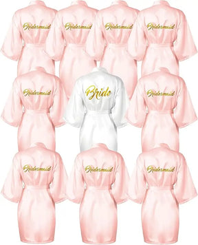 10-piece satin kimono robe set featuring one white "Bride" robe and nine pink "Bridesmaid" robes, ideal for wedding showers.