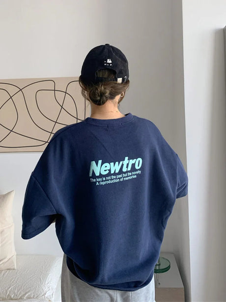 Oversized navy Harajuku streetwear tee featuring the 'Newtro' print for a relaxed fit and casual style.