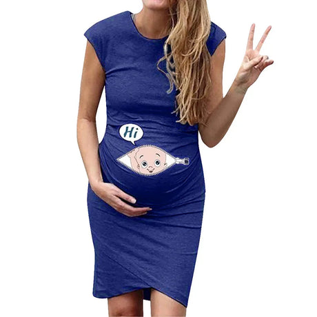 Woman wearing a loose casual maternity dress with cartoon design, showcasing a fun baby graphic, perfect for summer.