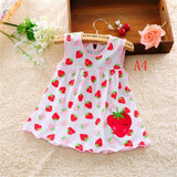 Cotton sleeveless dress for baby girls featuring a fun strawberry pattern, perfect for summer wear.