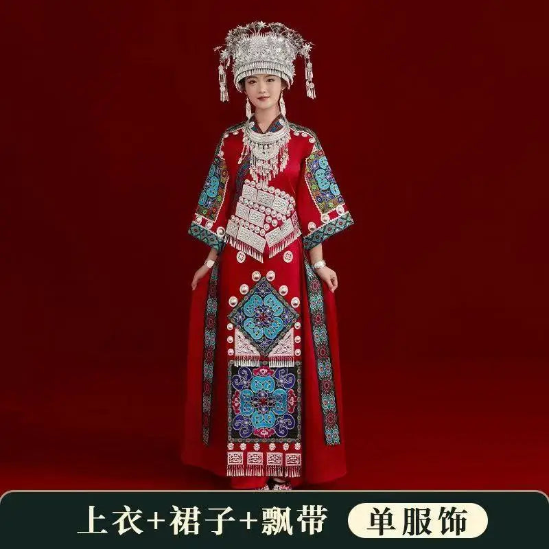 Miao Embroidery Suit for women, a vibrant red festival costume featuring intricate patterns and traditional accessories.
